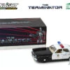 Greenlight 1:18 - The Terminator / 1977 Dodge Monaco Metropolitan Police With T-800 Endoskeleton Figure